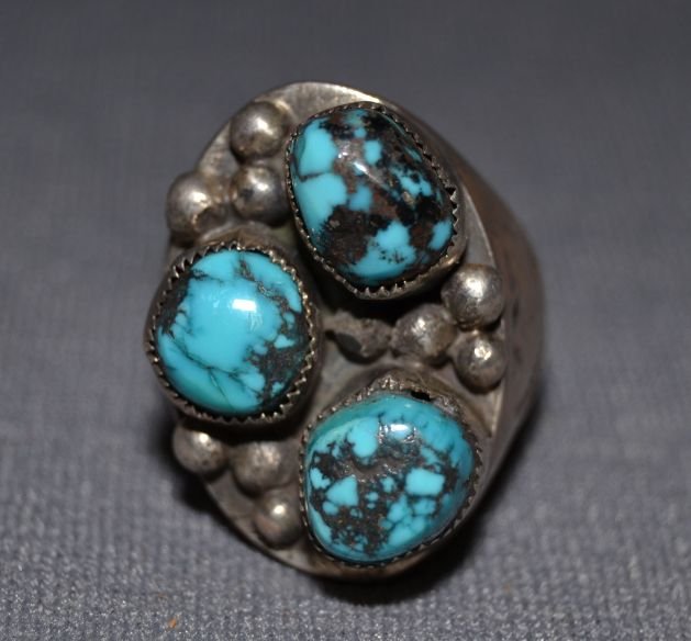 NAVAJO SILVER RING: 1960s 70s sterling silver 3 turquoise stones mans style size 10.75 Shipping charge are for the United States. The shipping on this lot is $10.00. Outside the United States there will be additional shi