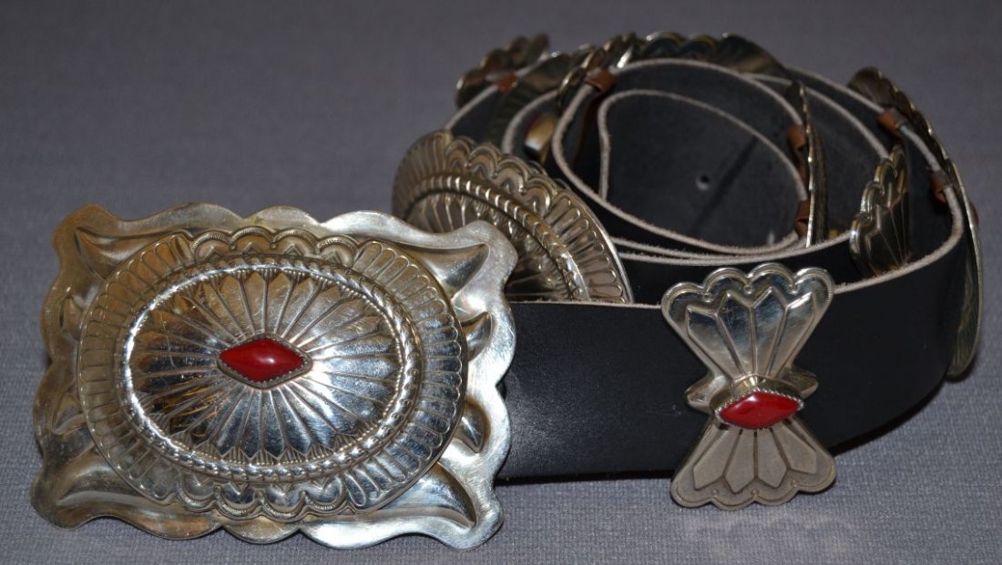 NAVAJO CONCHO BELT: 1980s 90s German silver and simulated coral buckle 2.5"x3.5" 4 conchos 2"x3" 5 butterflies 2"x1.25" 41" long Shipping charge are for the United States. The shipping on this lot is $15.00. Outside the 