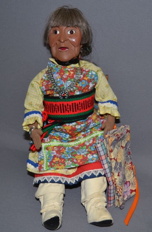 PUEBLO DOLL: 1960s 70s hand made portraying Maria Martinez with hand made silver necklace and bracelet and chair 17" tall Shipping charge are for the continental United States only There will be additional shippin