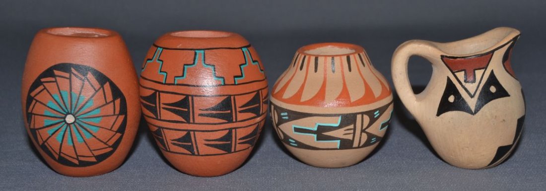 FOUR JEMEZ POTTERY BOWLS: 1980s 90s tallest signed M. Toya 3"x2.75" jar signed M. Fragua 3"x2.75" picture signed FC Gachupin 2.75"x2.75"x2.25" smallest signed M.T.C 2.5"x2.75" Shipping charge are for the continental United Sta