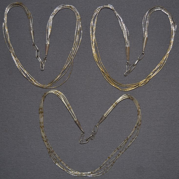 THREE NAVAJO SILVER NECKLACE: 1960s 70s liquid silver style 5 strands each approx. 16" long each Shipping charge are for the continental United States only There will be additional shipping fees on shipments to Hawaii, Alaska and 