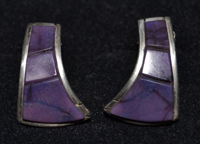 HOPI/LAGUNA SILVER EARRINGS: contemporary sugilite stones marked DUKEPOO 1"x.75" Shipping charge are for the continental United States only There will be additional shipping fees on shipments to Hawaii, Alaska and outside the Uni