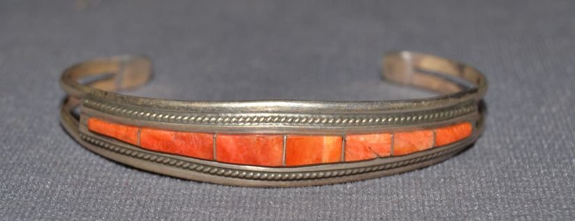 NAVAJO SILVER BRACELET: 1980s 90s sterling silver and shell signed T. sterling R.5"x.5"x1.5" Shipping charge are for the continental United States only There will be additional shipping fees on shipments to Hawaii, Alaska an