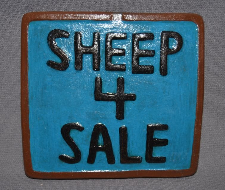 NAVAJO POTTERY TILE: contemporary raised and painted design says "sheep 4 sale" signed EM for Elizabeth Manygoats 5"x5.25"" Shipping charge are for the continental United States only There will be additional shipping fees