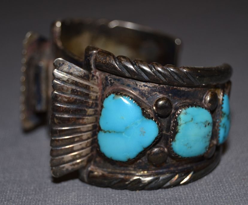 NAVAJO WATCH BAND: 1960s 70s sterling silver 6 turquoise stones 5.75"X1.75"X1.5"" Shipping charge are for the continental United States only There will be additional shipping fees on shipments to Hawaii, Alaska and outs