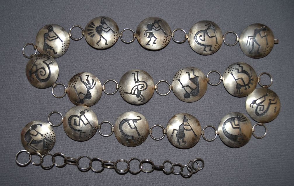 HOPI CONCHO BELT: contemporary sterling silver link style shadow box design signed with logo for Manuel Hoyungowa buckle 1.5"X1.75" 15 conchos 1.5" diameter 42" long" Shipping charge are for the continental United Stat