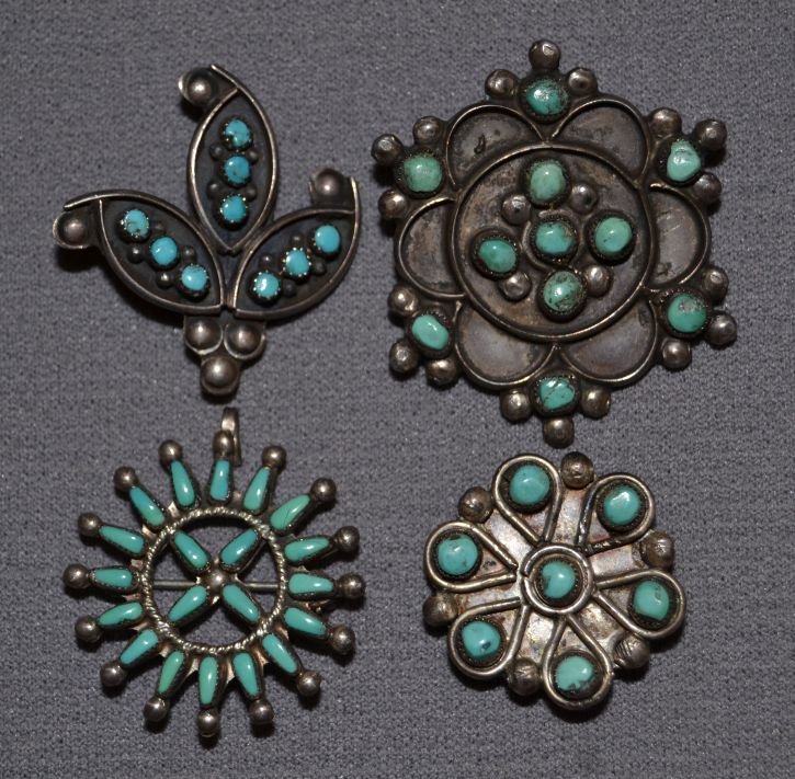 FOUR NAVAJO PINS: 1960s 70s sterling silver and turquoise largest 1.5"x1.5" small on 1.25" diameter Shipping charge are for the continental United States only There will be additional shipping fees on shipments to Hawa