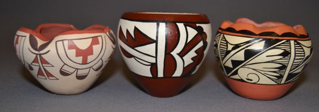 THREE JEMEZ POTTERY BOWLS: 1980s 90s all are polychrome tallest signed Andrea Tsosie 3"x3.5" medium signed MM Toya 3"x3.5" smallest signed F. Gachupin 2.5"x4" has minor paint loss Shipping charge are for the continental United 