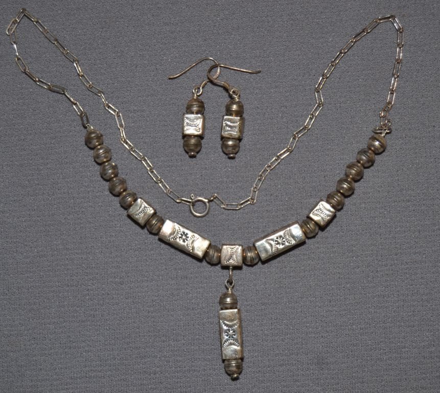 NAVAJO NECKLACE AND EARRINGS: 1980s 90s sterling silver hand stamped beads 16" long earrings 1" long Shipping charge are for the continental United States only There will be additional shipping fees on shipments to Hawaii, Alaska 