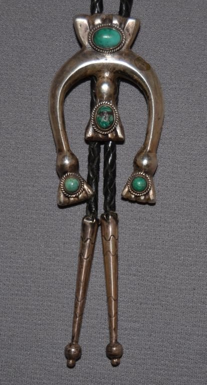 NAVAJO BOLO TIE: 1950s 60s sand cast sterling silver 5 turquoise stones 2.75"x1.5" Shipping charge are for the continental United States only There will be additional shipping fees on shipments to Hawaii, Alaska and o