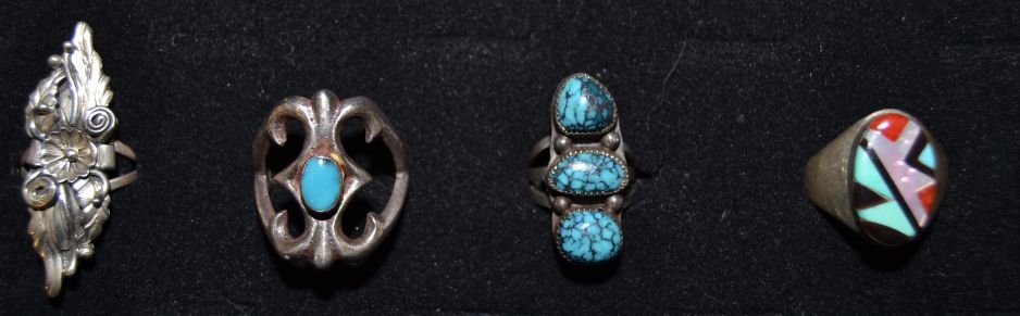 FOUR NAVAJO RINGS: 1960s 80s sterling silver sand cast single turquoise stone size 9.5 leaf pattern size 7.5 3 turquoise stones size 4.5 stone to stone inlay size 11.5 Shipping charge are for the continental United Stat