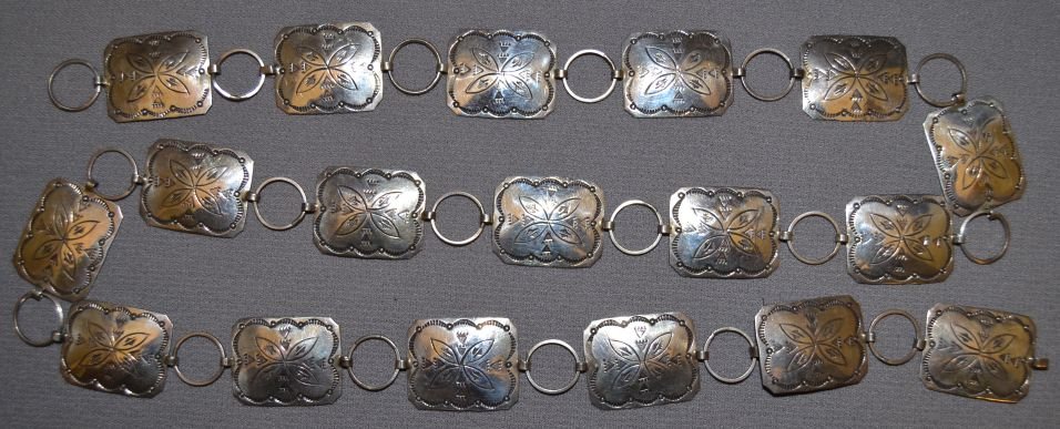 NAVAJO CONCHO BELT: 1960s 70s sterling silver stamped design link style buckle 1"x1.5" 17 Conchos 1"x1.5" 36" long Shipping charge are for the continental United States only There will be additional shipping fees on ship