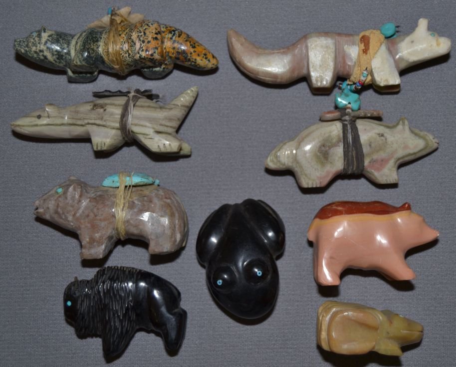COLLECTION OF NINE PUEBLO FETISHES: 1980s 90s hand carved buffalo is missing horn 1.5"x2"x.75" Shipping charge are for the continental United States only There will be additional shipping fees on shipments to Hawaii, Alaska and outside 