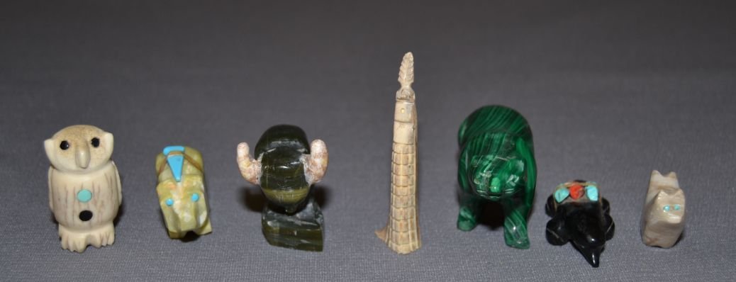 SEVEN PUEBLO FETISHES: 1980s 90s 5 hand carved stones 2 are carved antler largest 1.5"x1"x3" Shipping charge are for the continental United States only There will be additional shipping fees on shipments to Hawaii, Alaska a