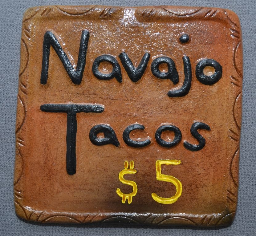 NAVAJO POTTERY TILE: contemporary glaze and painted design "Navajo Tacos" signed Elizabeth M 4.75"x5" Shipping charge are for the continental United States only There will be additional shipping fees on shipments to Hawai
