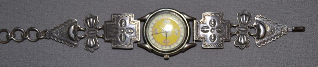 NAVAJO SILVER WATCH BAND: 1960s 70s sterling silver stamped design link style marked D. Lucas with Indian style watch 8.25"x1" Shipping charge are for the continental United States only There will be additional shipping fees o