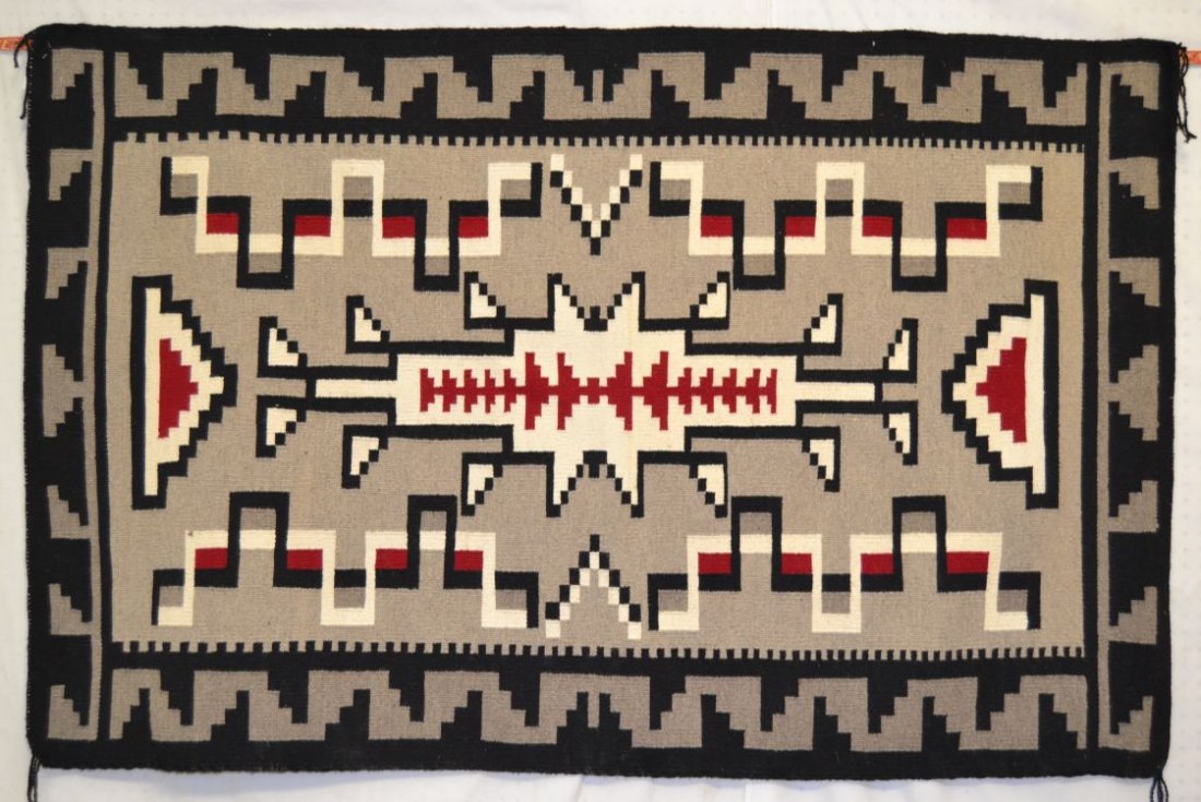 NAVAJO TEXTILE: 1960s 70s hand woven in black grey white and red has weavers tag for Cicilia M Joe 71"x45" Shipping charge are for the continental United States only There will be additional shipping fees on shipment