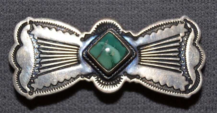 NAVAJO SILVER PIN: 1960s 70s sterling silver stamped design single square turquoise stone signed with symbol and 925 .75"x2" Shipping charge are for the continental United States only There will be additional shipping f