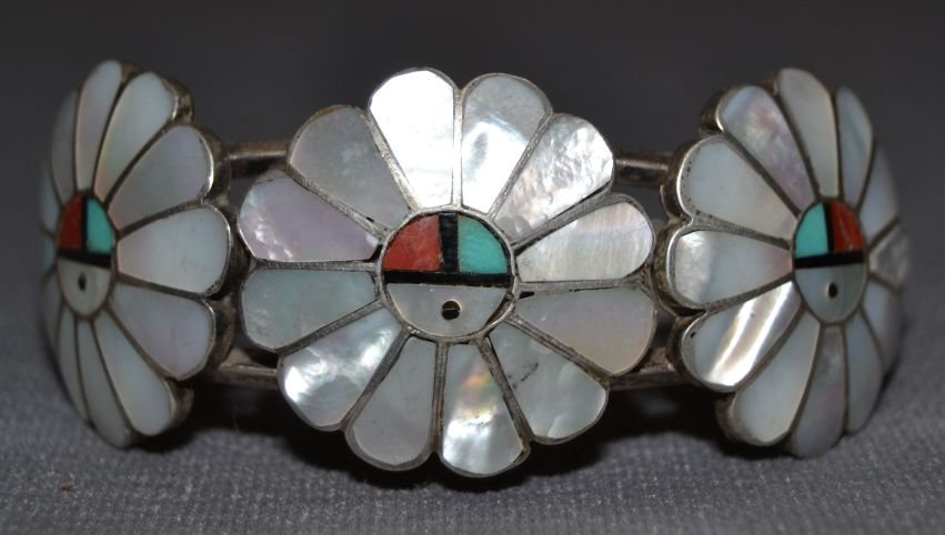 NAVAJO SILVER BRACELET: 1970s 80s sterling silver channel inlay sunface design with mother of pearl jet turquoise and shell signed A. Gasper 5.25"x1"x1" Shipping charge are for the continental United States only There will b