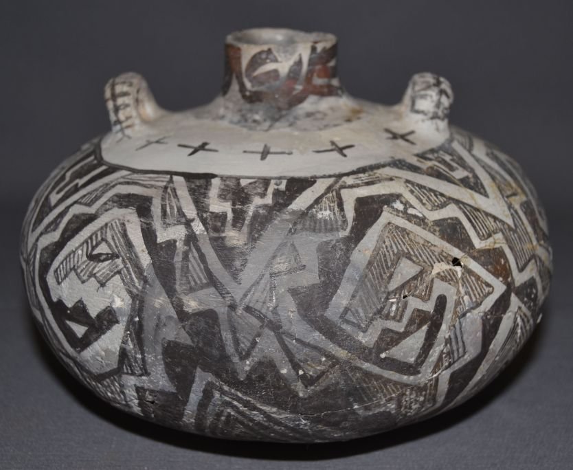 ANASAZI POTTERY JAR: prehistoric black on white geometric design approx. 10% plaster 5.25"x8" Shipping charge are for the continental United States only There will be additional shipping fees on shipments to Hawaii, Alask