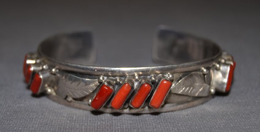 NAVAJO SILVER BRACELET: 1970s 80s sterling silver coral and leaf design marked 925 6.5"x.75"x1" Shipping charge are for the continental United States only There will be additional shipping fees on shipments to Hawaii, Alaska