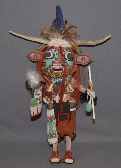 HOPI KACHINA: 1970s 80s hand carved and painted cow with silver belt 17" tall Shipping charge are for the continental United States only There will be additional shipping fees on shipments to Hawaii, Alaska and out