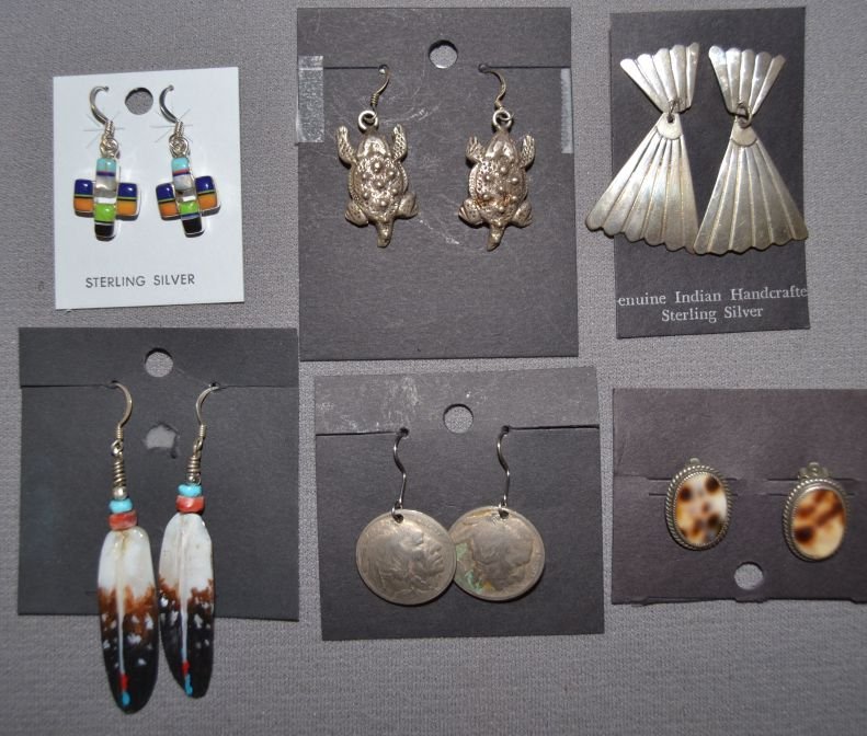 SIX PAIRS OF PUEBLO EARRINGS: 1970s 90s 3 pair sterling silver longest hand carved shell leaf style 2.5"x.5" Shipping charge are for the continental United States only There will be additional shipping fees on shipments to Hawaii,
