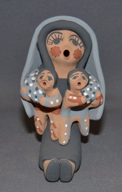 JEMEZ POTTERY STORYTELLER: 1980s 90s holding 2 babies signed F. Fragua 5"x3"x3" Shipping charge are for the continental United States only There will be additional shipping fees on shipments to Hawaii, Alaska and outside the Un
