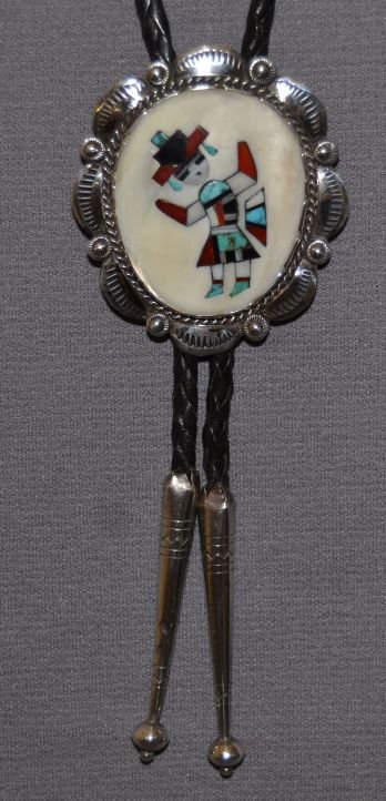 NAVAJO SILVER BOLO: 1960s 70s sterling silver stone to stone inlay on shell 2.75"X2.25" Shipping charge are for the continental United States only There will be additional shipping fees on shipments to Hawaii, Alaska and