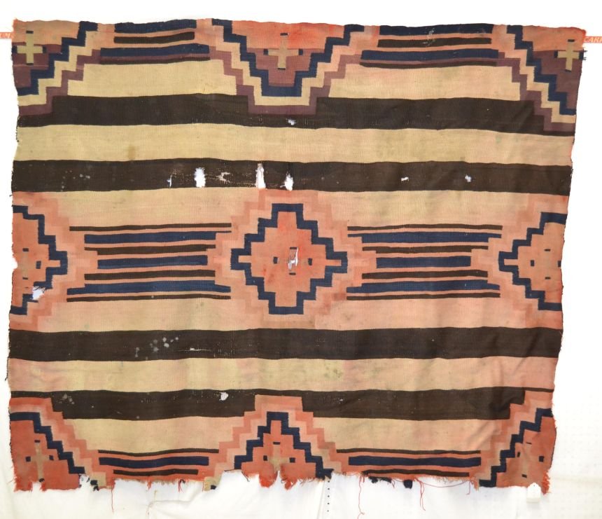 NAVAJO TEXTILE: 1860s 70s 3rd phase chiefs blanket has major holes bleeding and edge ware is dirty 73"x59" Shipping charge are for the continental United States only There will be additional shipping fees on shipment