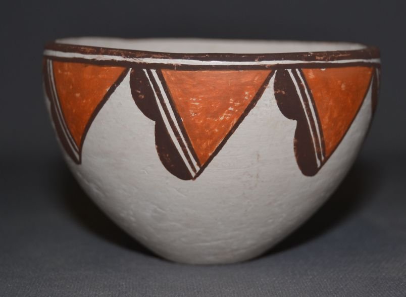 ACOMA POTTERY BOWL: 1960's polychrome design bowl signed Lucy M Lewis 2.5" x 3.75" Shipping charge are for the continental United States only There will be additional shipping fees on shipments to Hawaii, Alaska and outs