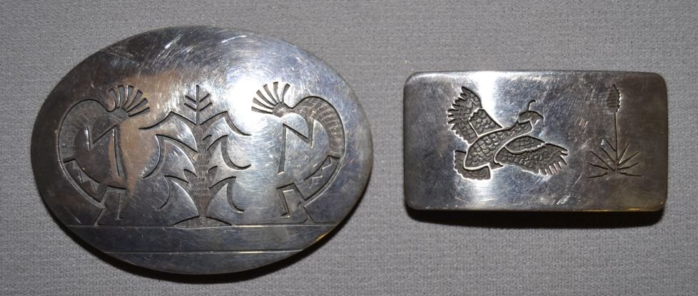 TWO HOPI BELT BUCKLES: 1980's sterling silver flute player and corn stock, marked with hall mark made for 1.5" belt 2.5" x 3.5" and other with quail and yucca made for 1" belt 1.25" x 2.5" Shipping charge are for the contin