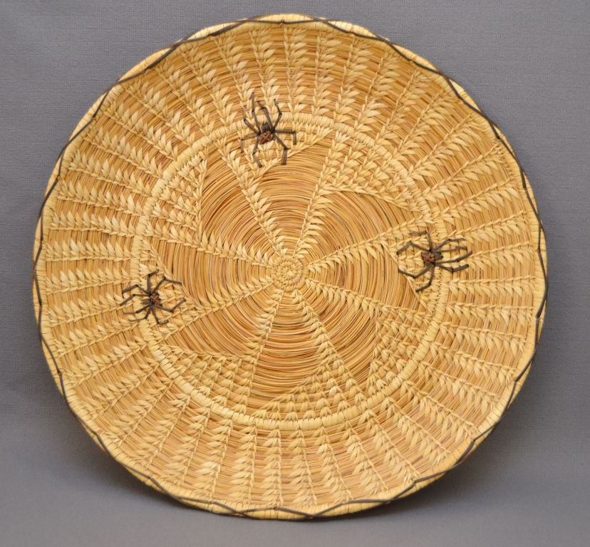 PAPAGO BASKETRY TRAY: 1980s 90s open weave with black widow spiders 2"x16.25" Shipping charge are for the continental United States only There will be additional shipping fees on shipments to Hawaii, Alaska and outside the