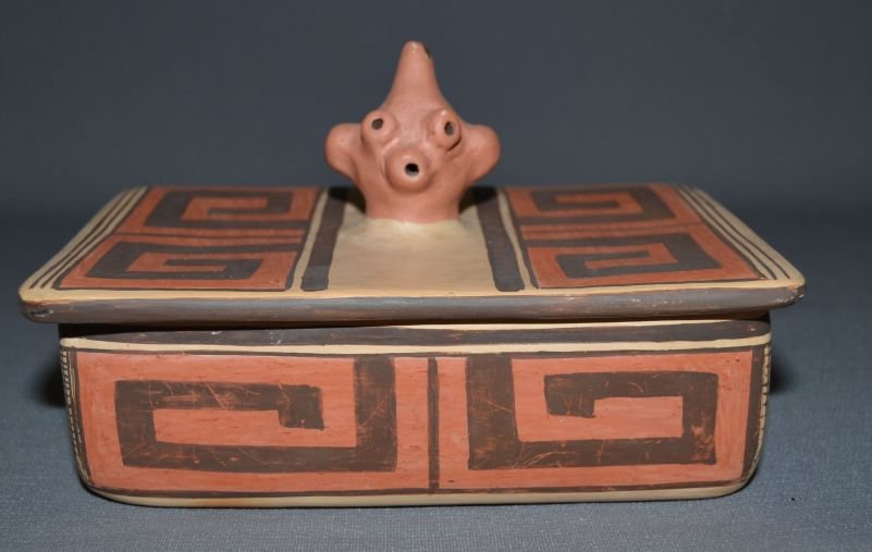 HOPI POTTERY BOX: 1980s 90s polychrome design with mud head handle signed Nylan Nampeyo 5"x7.5"x4.25" Shipping charge are for the continental United States only There will be additional shipping fees on shipments to Ha