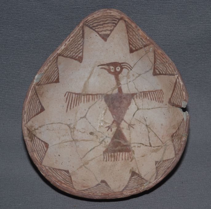 ANASAZI POTTERY SCOOP: prehistoric red on white geometric and bird design approx. 20% plaster 2.25"x6.5"x5.75" Shipping charge are for the continental United States only There will be additional shipping fees on shipments t