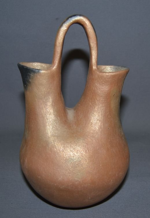 TAOS POTTERY WEDDING VASE: 1980s 90s micaceous clay signed Rafaelita Espinoza in pen 10.5"x6" Shipping charge are for the continental United States only There will be additional shipping fees on shipments to Hawaii, Alaska and 
