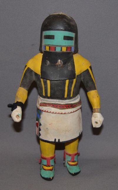 HOPI KACHINA: 1960's hand carved and painted cotton wood, belt is broken, foot has been broken and glued, 12" tall Shipping charge are for the continental United States only There will be additional shipping fees o