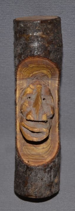 IROQUOIS LOG CARVING: 1940's hand carved wood depicting false face mask, 6" x 2" Shipping charge are for the continental United States only There will be additional shipping fees on shipments to Hawaii, Alaska and outside 