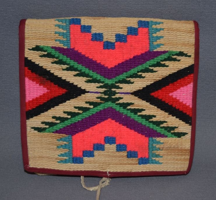 PEZ PERCE BELT POUCH: 1950-60s cornhusk with yard design, cloth lined, 6" x 7" Shipping charge are for the continental United States only There will be additional shipping fees on shipments to Hawaii, Alaska and outside th