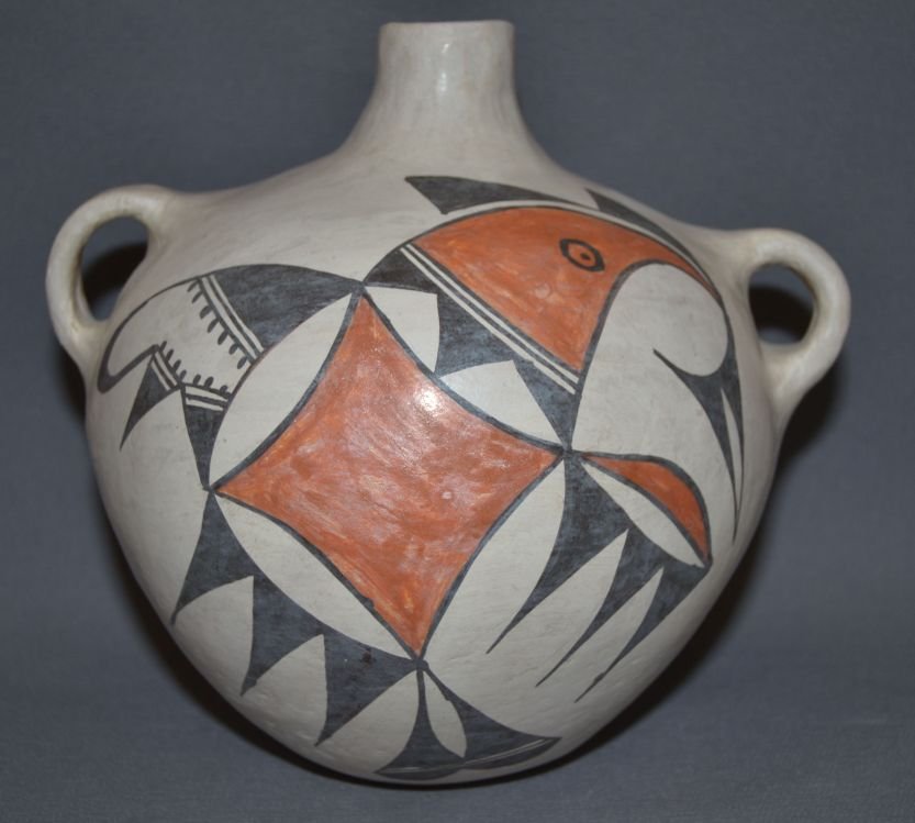 ACOMA WEDDING VASE: 1970's polychrome bird design on one side geometric fine line design on other, 8'' x 9'' Shipping charge are for the continental United States only There will be additional shipping fees on shipments 