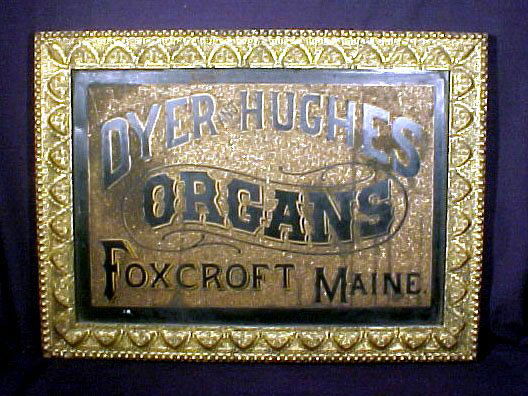 Antique Advertising Sign Music Organ Gold: This is a wonderful 19th century tin lithography advertising sign for Dyer & Hughes Organs of Foxcroft, Maine. It has a very unusual front surface which is heavily incrusted with a granular gold subst