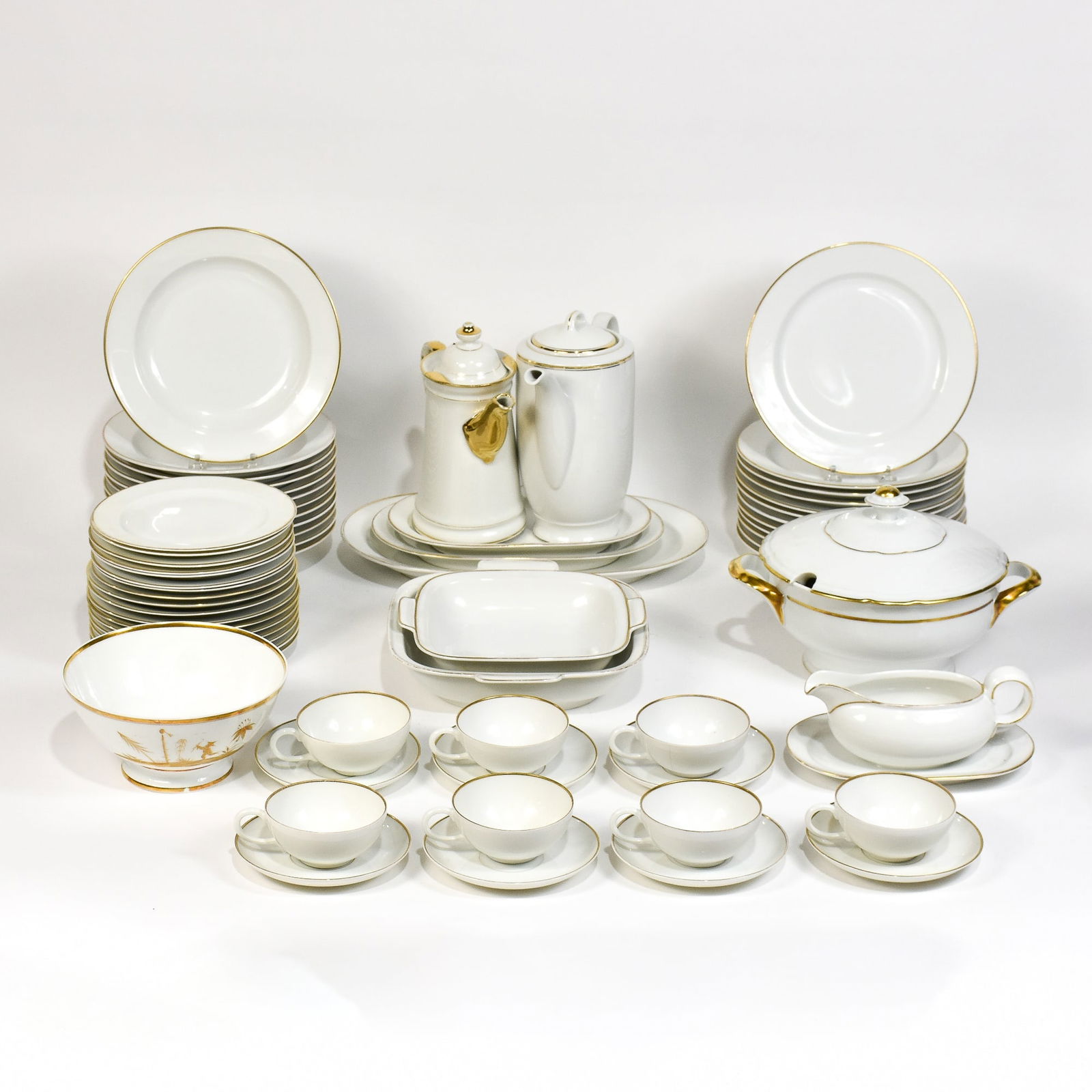 Volkstedt Porcelain Dinner Service: Including teapot, coffee pot, tureen, dinner plates, cups and saucers, etc 64 pieces total Tureen 5" h x 9" dia