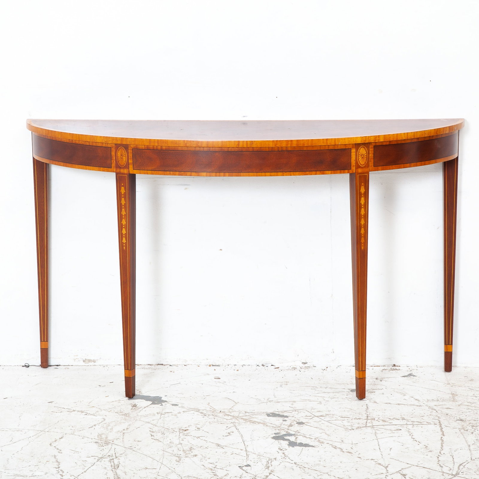 George III Style Mahogany Demilune Console: Henkel Harris * (32” h x 54” w x 15 1/2” d) Some scuffs and scratches