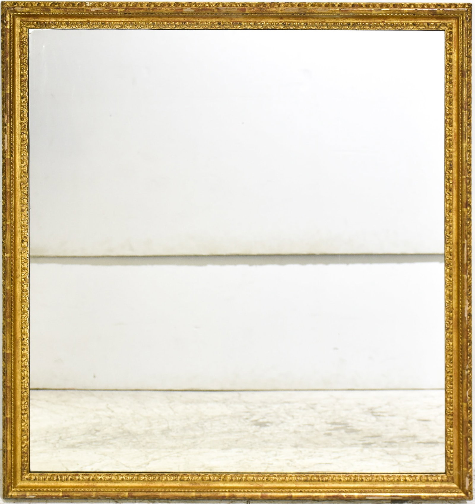 Gilt Framed Mirror: * (49" h x 45" w) Scratches, losses to gilding