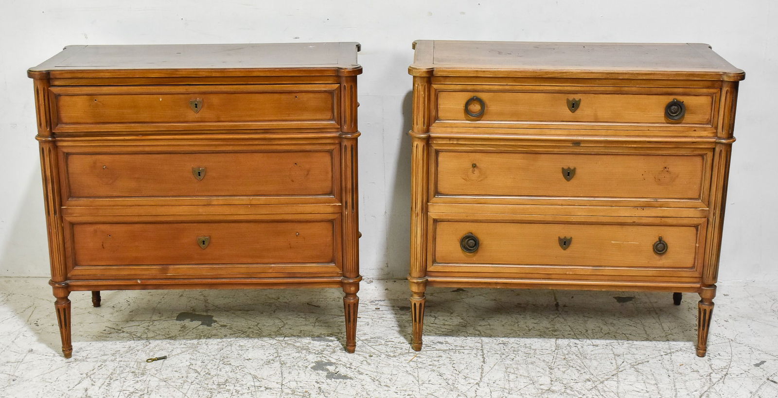 Pair of Directoire Fruitwood Commodes: * (32 1/2" h x 35" w x 16 1/2" d) One missing drawer pulls, one very sun faded, both overall wear