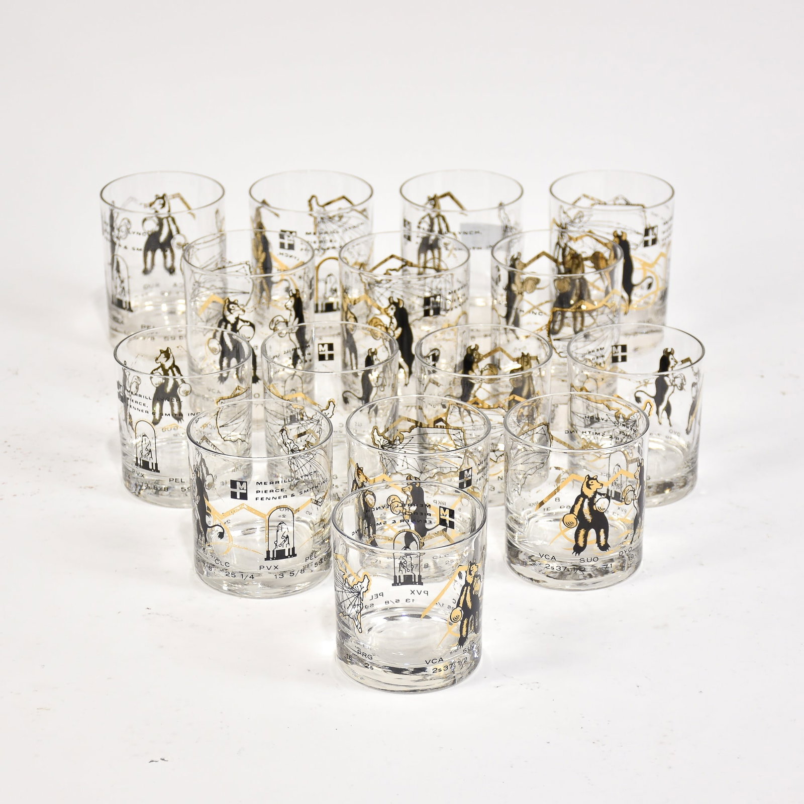 Set of 15 Enamel ‘Bull and Bear’ Decorated Barware: * (Larger 4" h x 3 1/4" dia) Rub to decoration