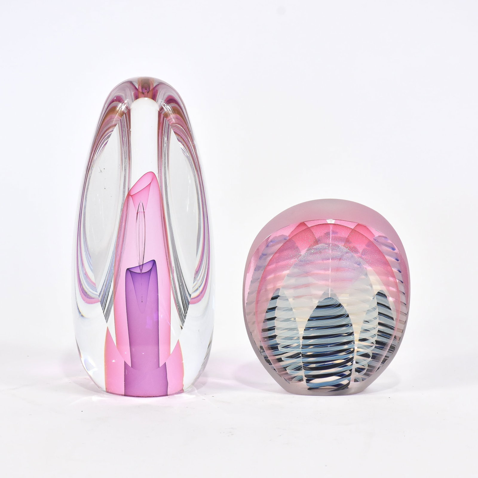 Two Contemporary Pink Cased Glass Sculptures: * (Tallest 8 1/4” h) Good