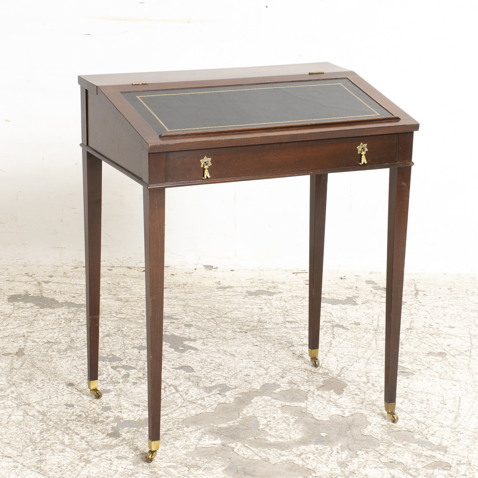 Mahogany Leather Top Slanted Writing Table: * (31 1/4" h x 25 1/2" w x 18 3/8" d) Scratches