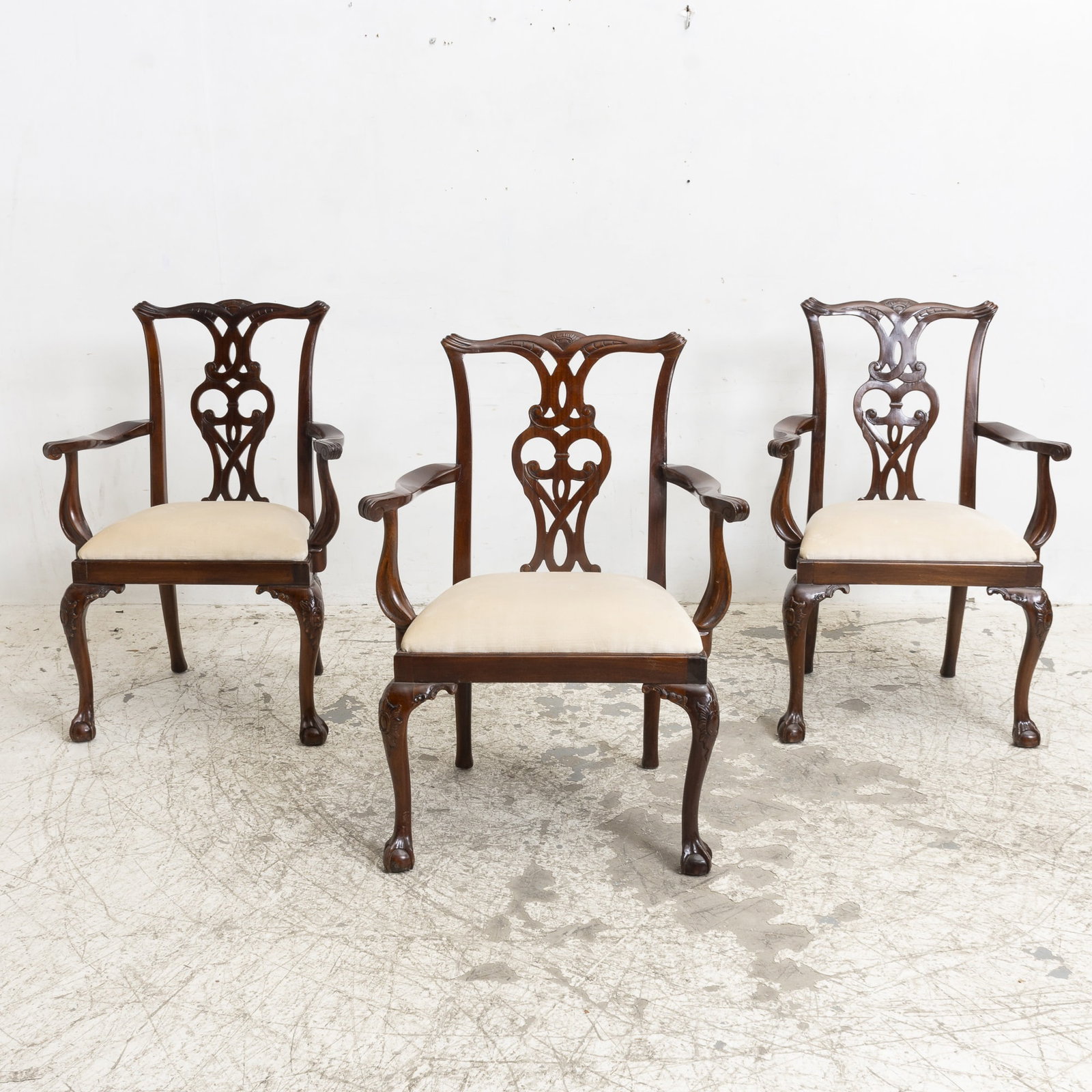 Three Chippendale Style Carved Mahogany Armchairs: * (39 1/2" h x 24 3/4" w x 16" d Seat to floor 18" h) Scratches, cushion not attached to one
