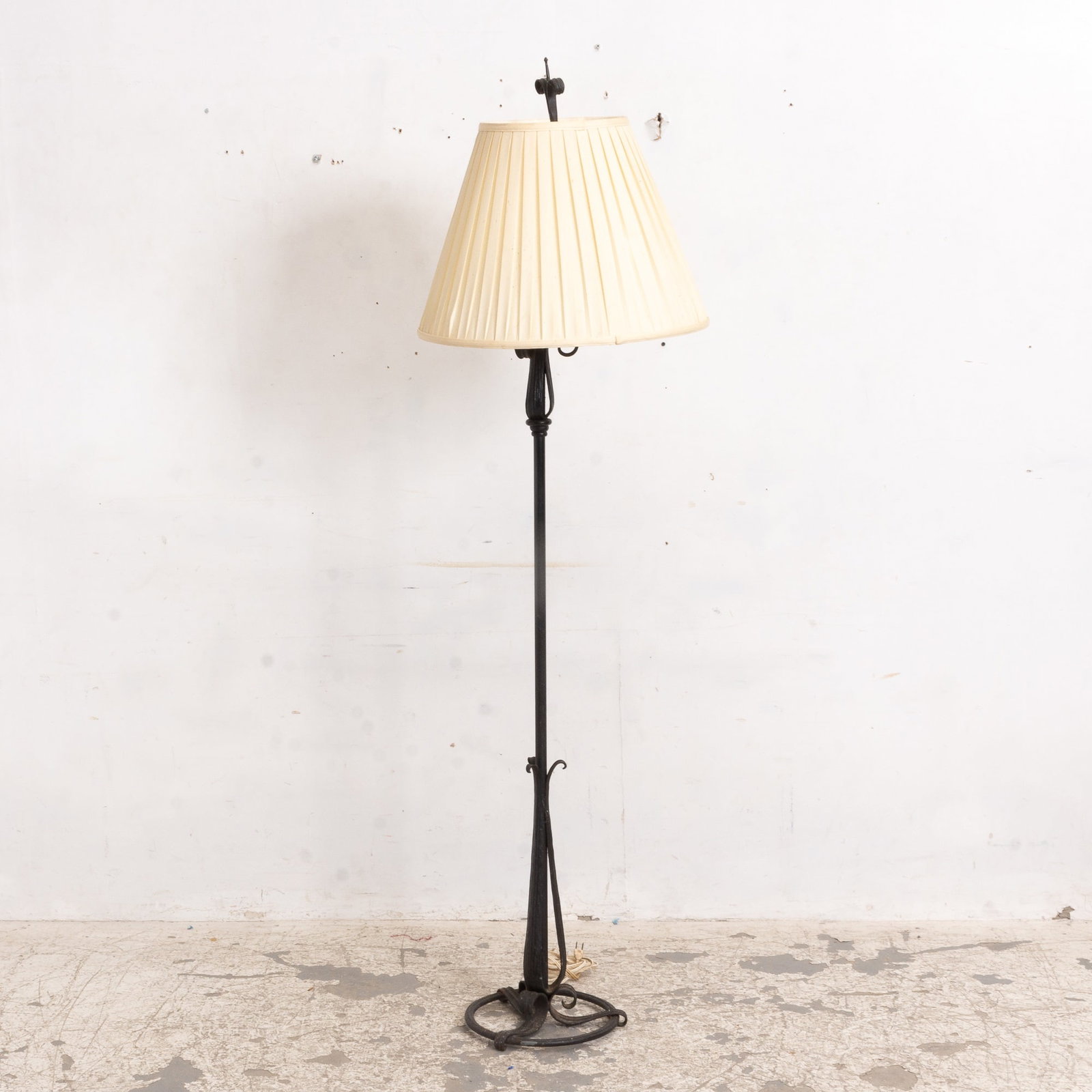 Wrought Iron Floor Lamp: With a scrolling terminal and a ring base. 68" h